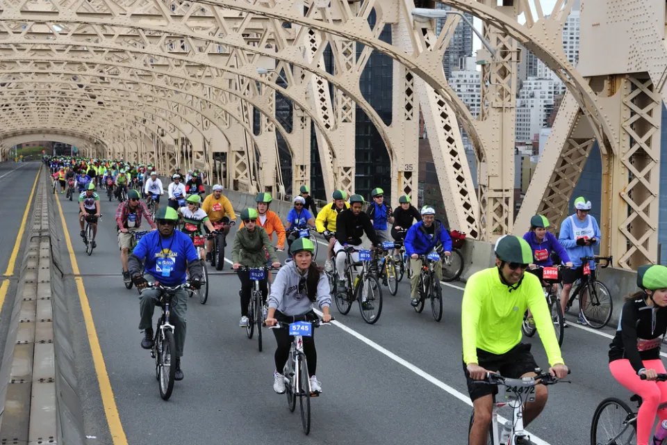 People biking across the Queensboro Bridge